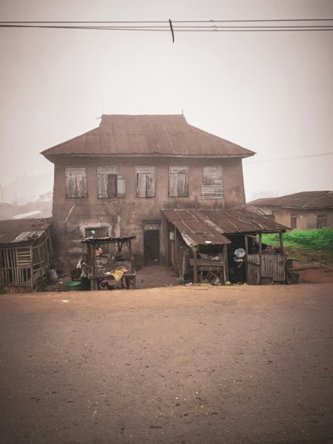 a house with a tractor in front