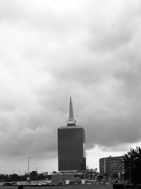 grayscale photo of high rise building