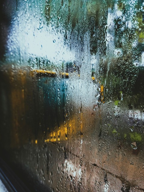 a window with rain drops on it