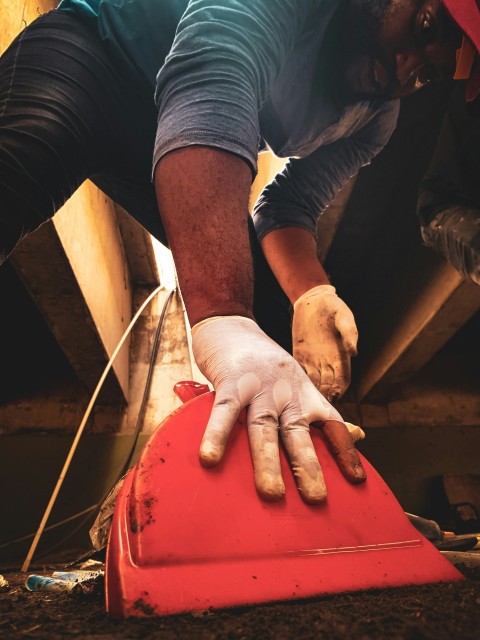 a person holding a pipe