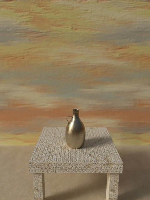 a silver vase sitting on top of a small table LO2lF04