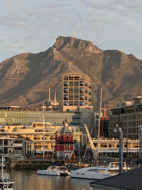 a city with a mountain in the background