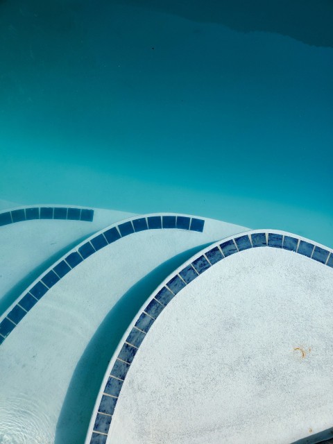 white and blue spiral stairs