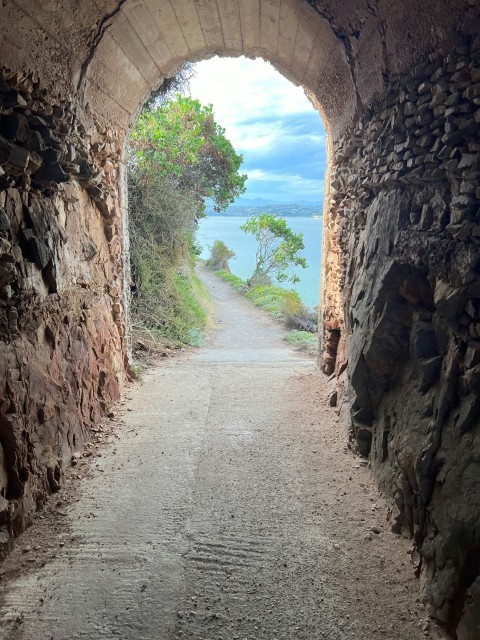 a stone tunnel leading into the ocean