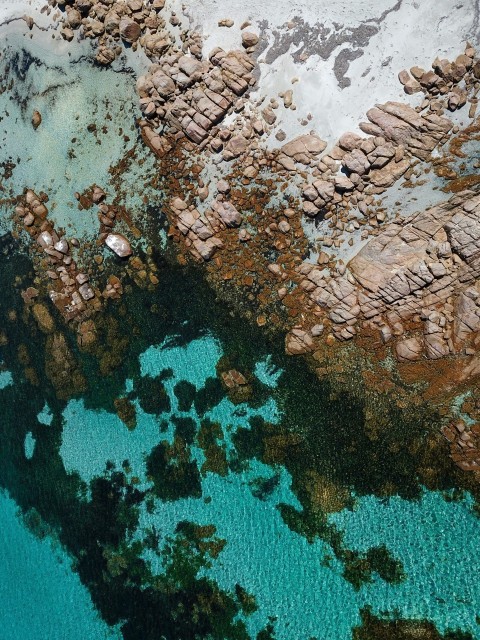 a birds eye view of a body of water