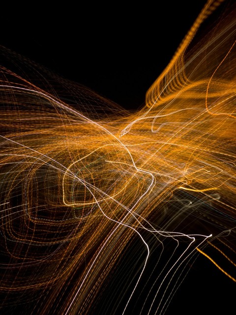 a blurry photo of a long exposure of lights