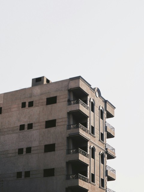 a tall building with balconies and balconies on it