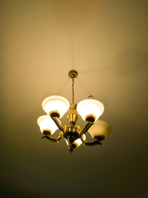 gold colored chandelier