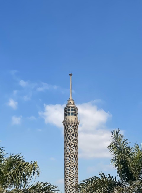 a tall tower with a clock on top of it