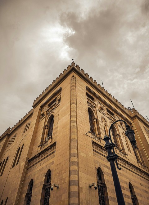 a tall building with a clock on the top of it