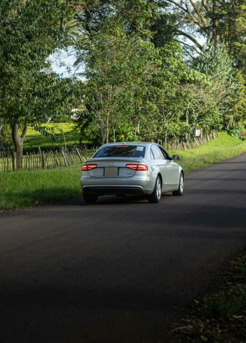 a car is parked on the side of the road