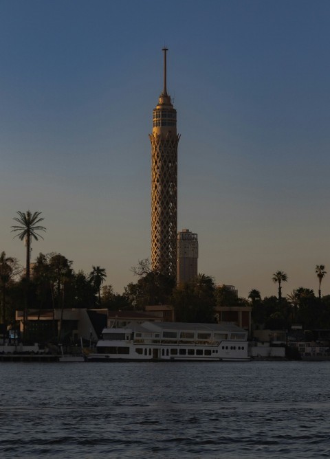 a very tall tower with a clock on its side