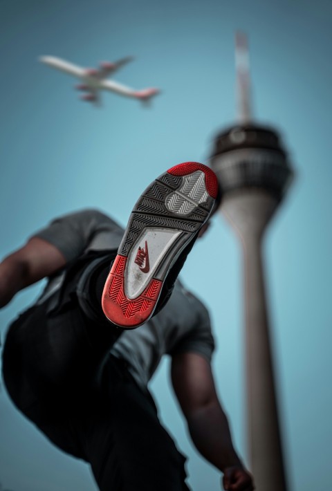 man wearing nike shoe