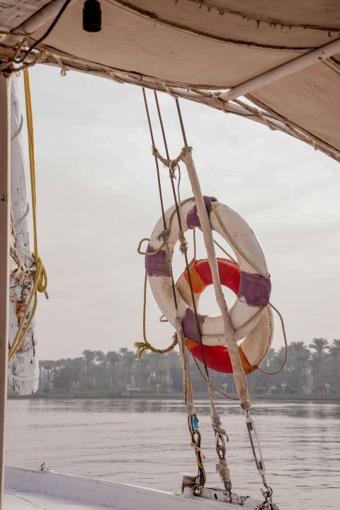 a life preserver hanging from the side of a boat