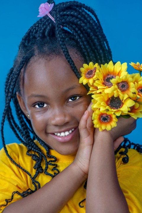 a person with flowers in the hair