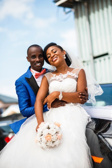 a man and woman in formal attire