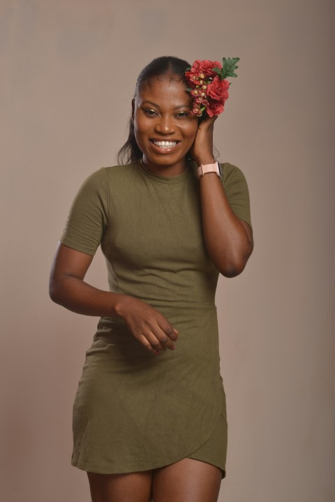 a woman with a flower in her hair