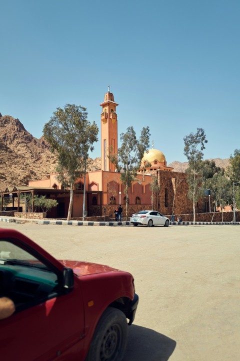 a building with a tower and a dome on top