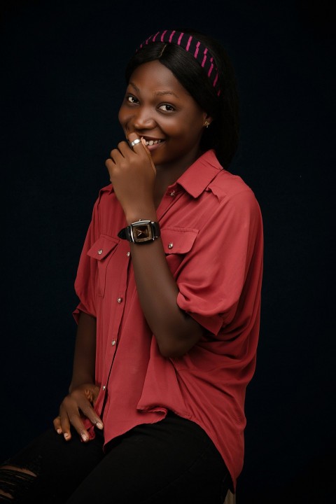 woman in red button up shirt