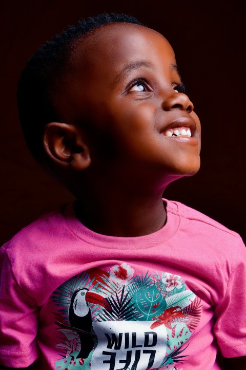 boy in purple crew neck shirt