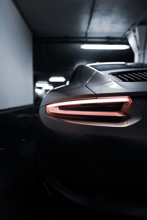 a close up of the tail lights of a sports car u