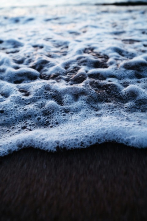 white textile on brown textile