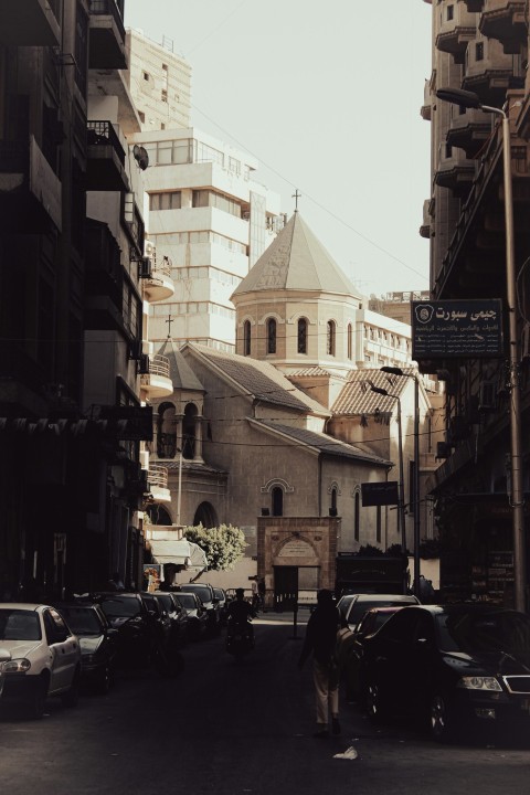 a city street filled with lots of tall buildings