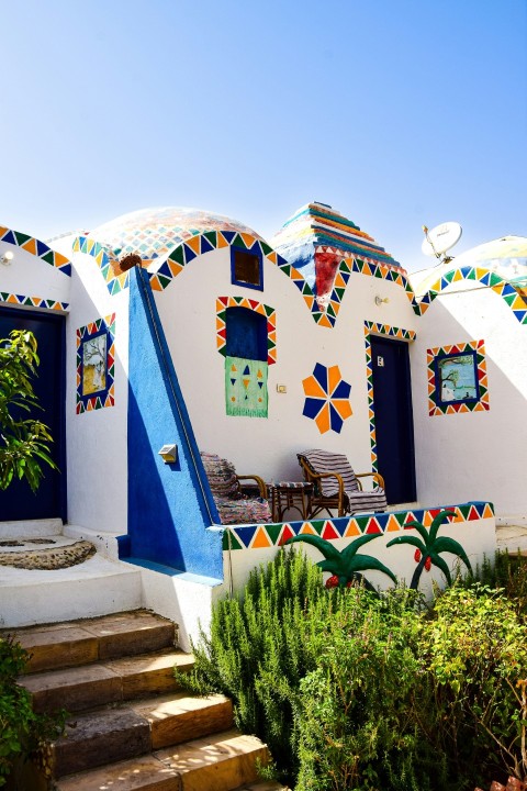 a building with colorful doors