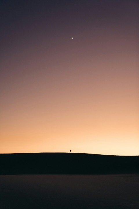 silhouette of mountain during sunset