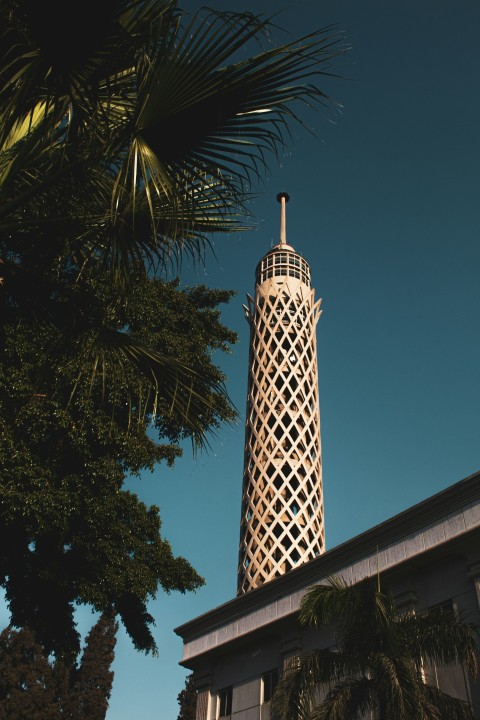 a very tall tower with a clock on its side