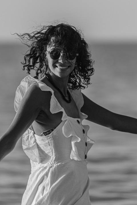 a woman with curly hair