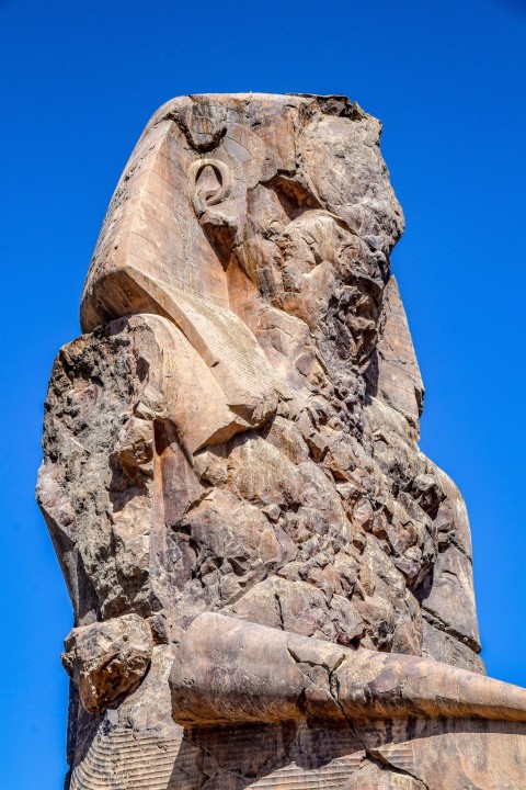 brown rock formation under blue sky during daytime