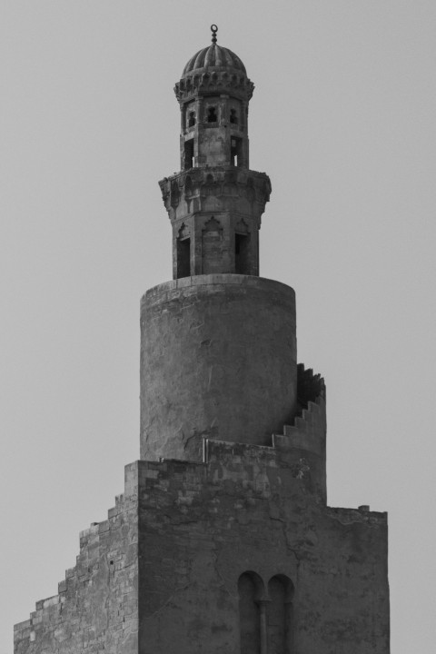 gray concrete tower under white sky