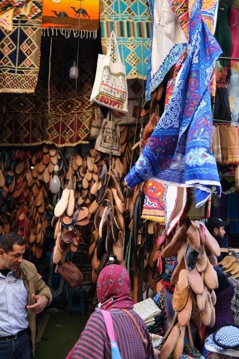 a group of people standing around a store