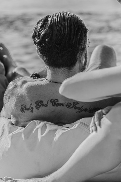 a person lying on the beach