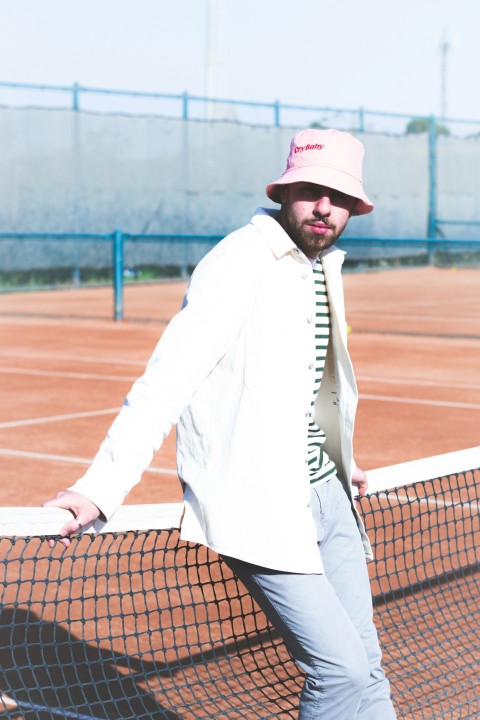 a person holding a tennis racket