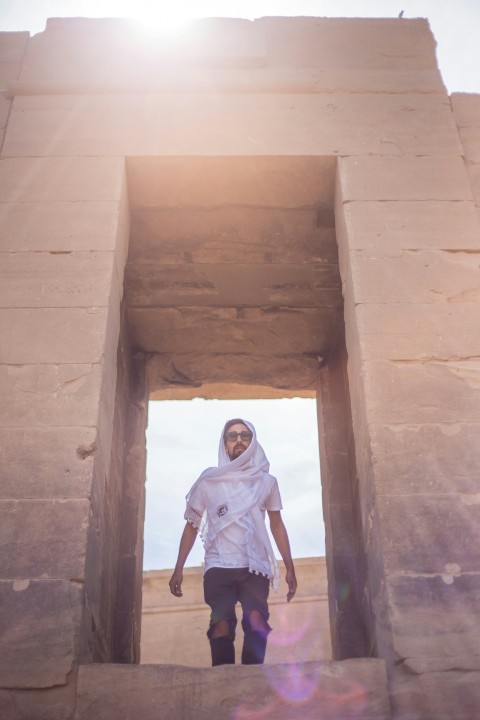 man standing on structure