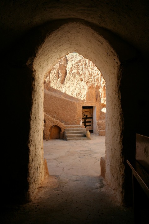 brown concrete tunnel during daytime