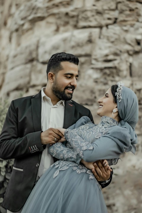 a man and woman posing for a picture