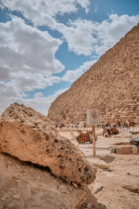 people near pyramid during daytime