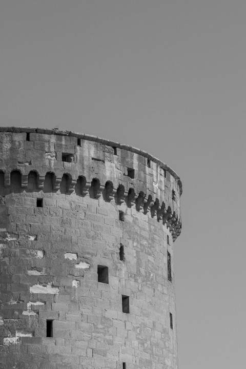 grayscale photo of concrete building