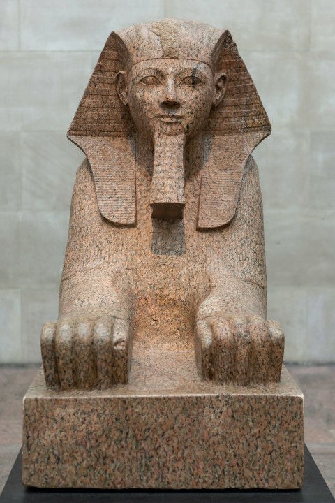 brown concrete statue during daytime