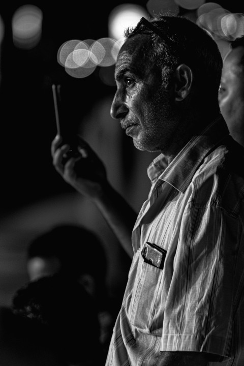 a man holding a pencil