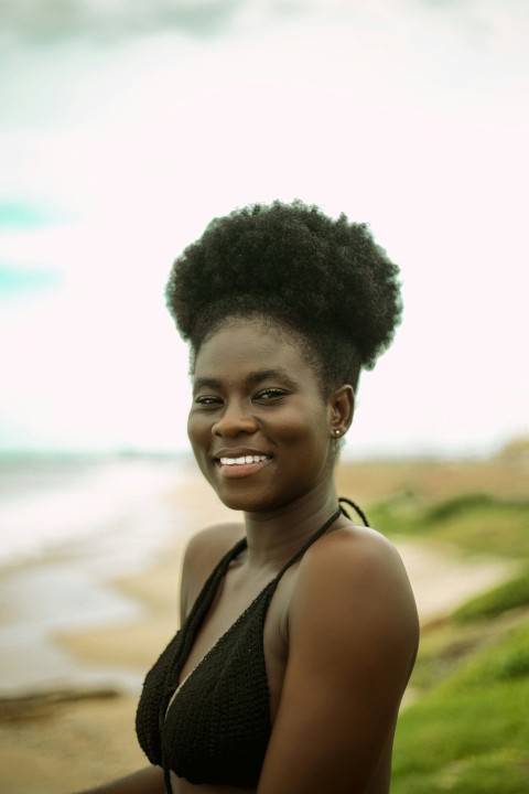 a woman in a bikini posing for a picture