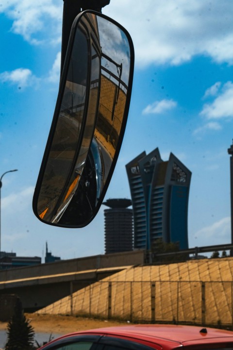 a rear view mirror hanging from the side of a car