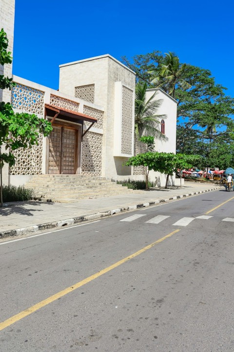 a street that has a building on the side of it