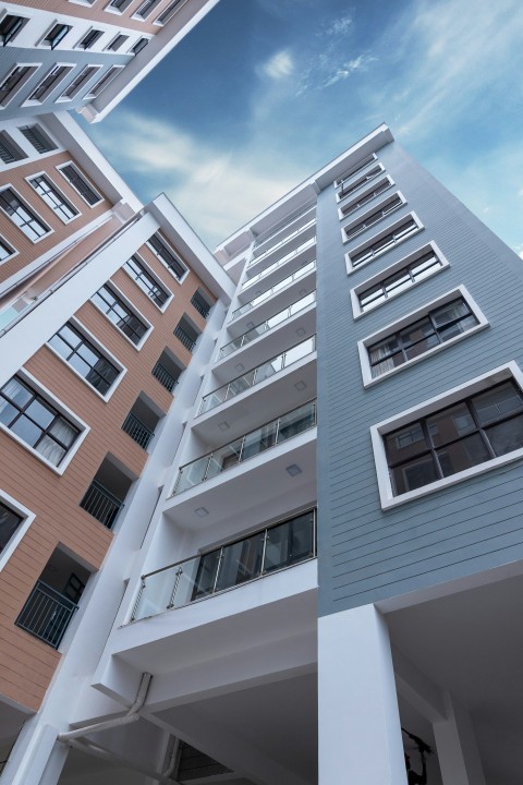 low angle photo of blue building