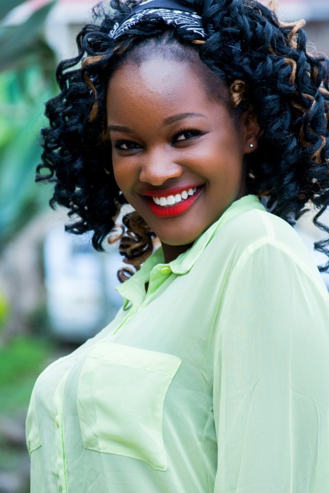 woman wearing green button up shirt