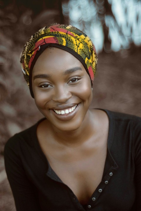 smiling woman wearing turban i2hoD