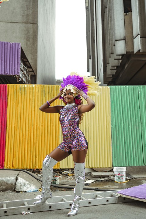 a woman in a purple and purple costume